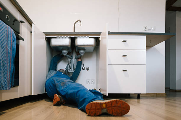 Professional Emergency Plumber technician working in Augusta, OH